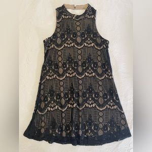 Women's dress, black lace with tan underlay. Andrée by Unit. Size Large